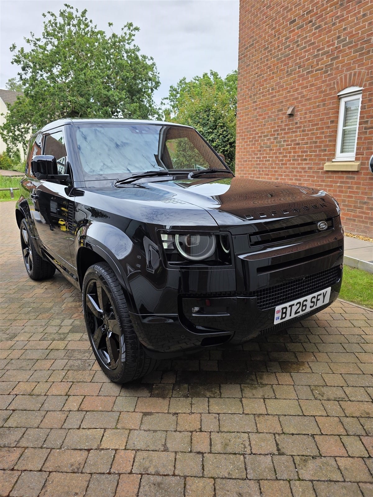 Land Rover Defender front quarter detail — Bronze Package